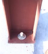 Red iron steel Beam bolted to foundation